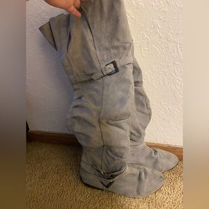 I’m selling these knee high grey boots!! So cute!